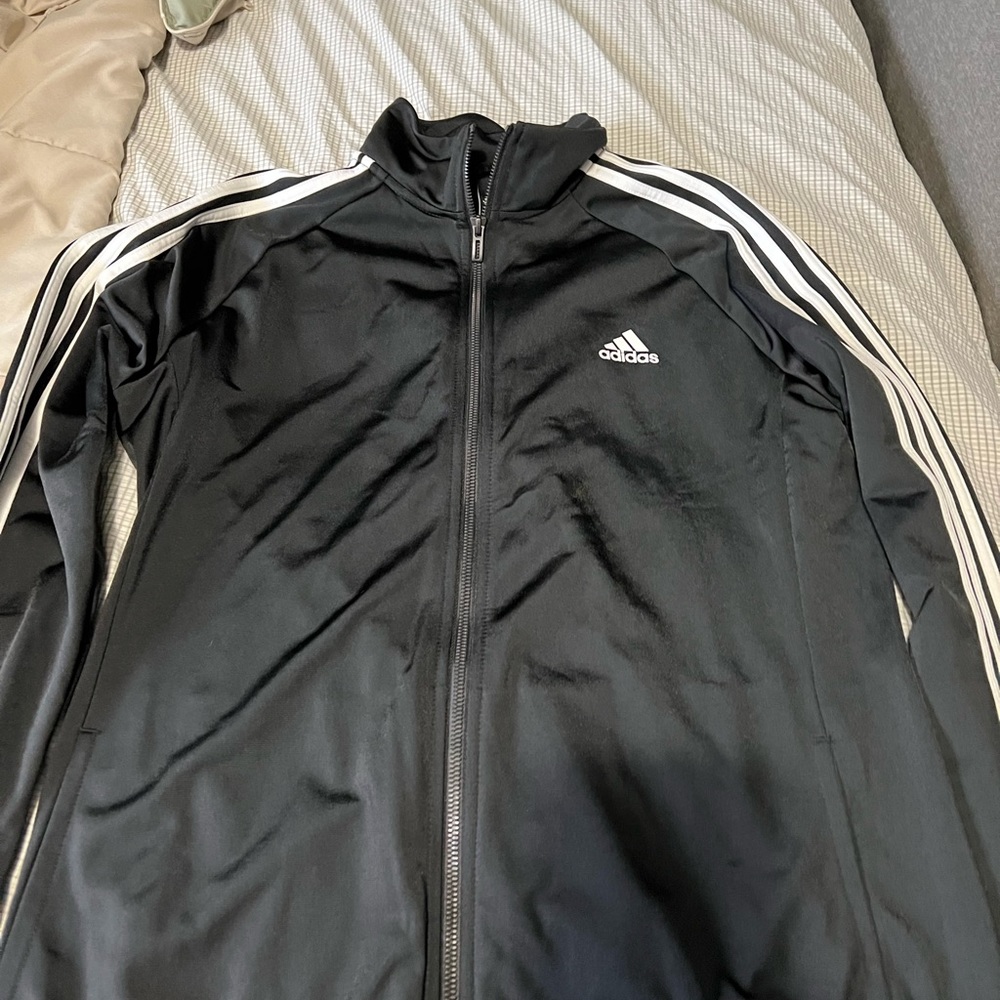 Adidas track jacket size large new without tags.